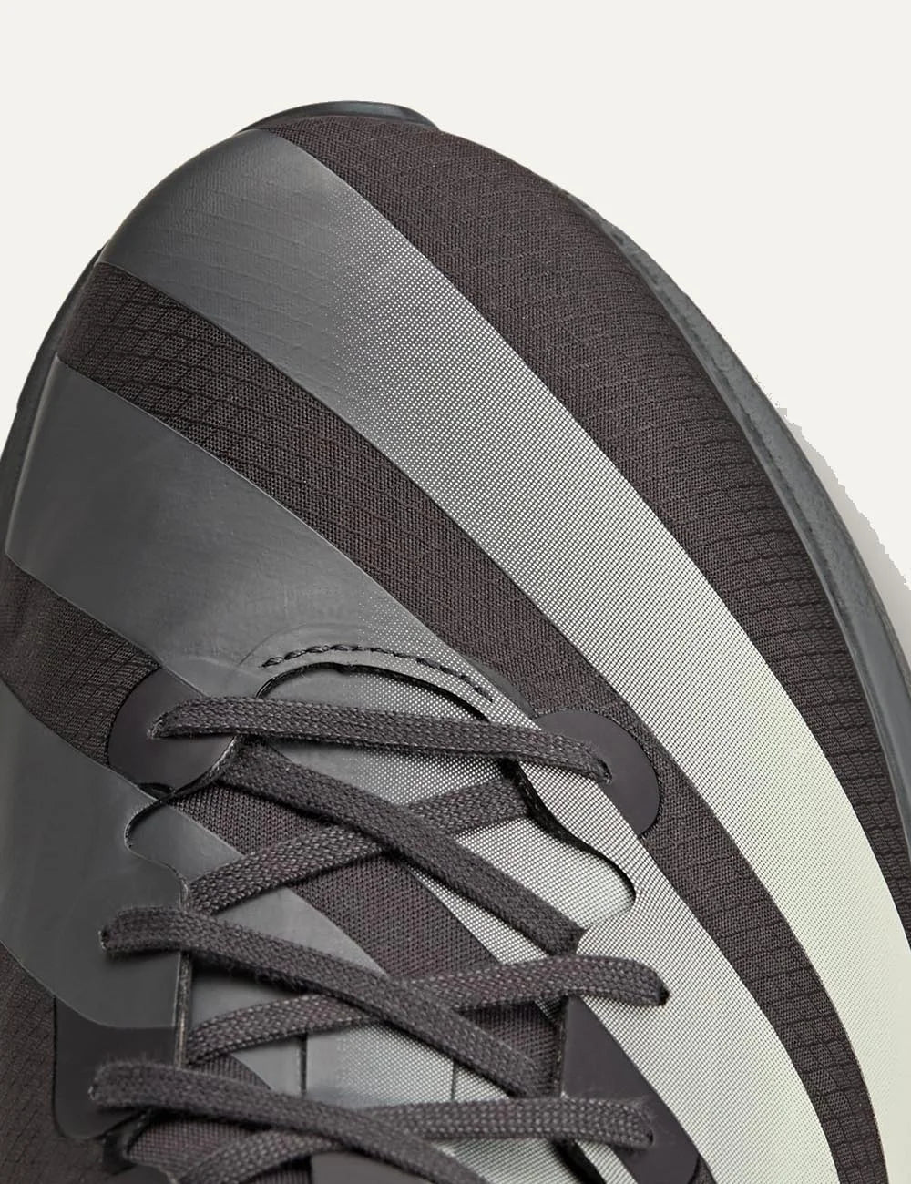 Y-3 Adios 9 sneaker black me off white stripes angled detail view