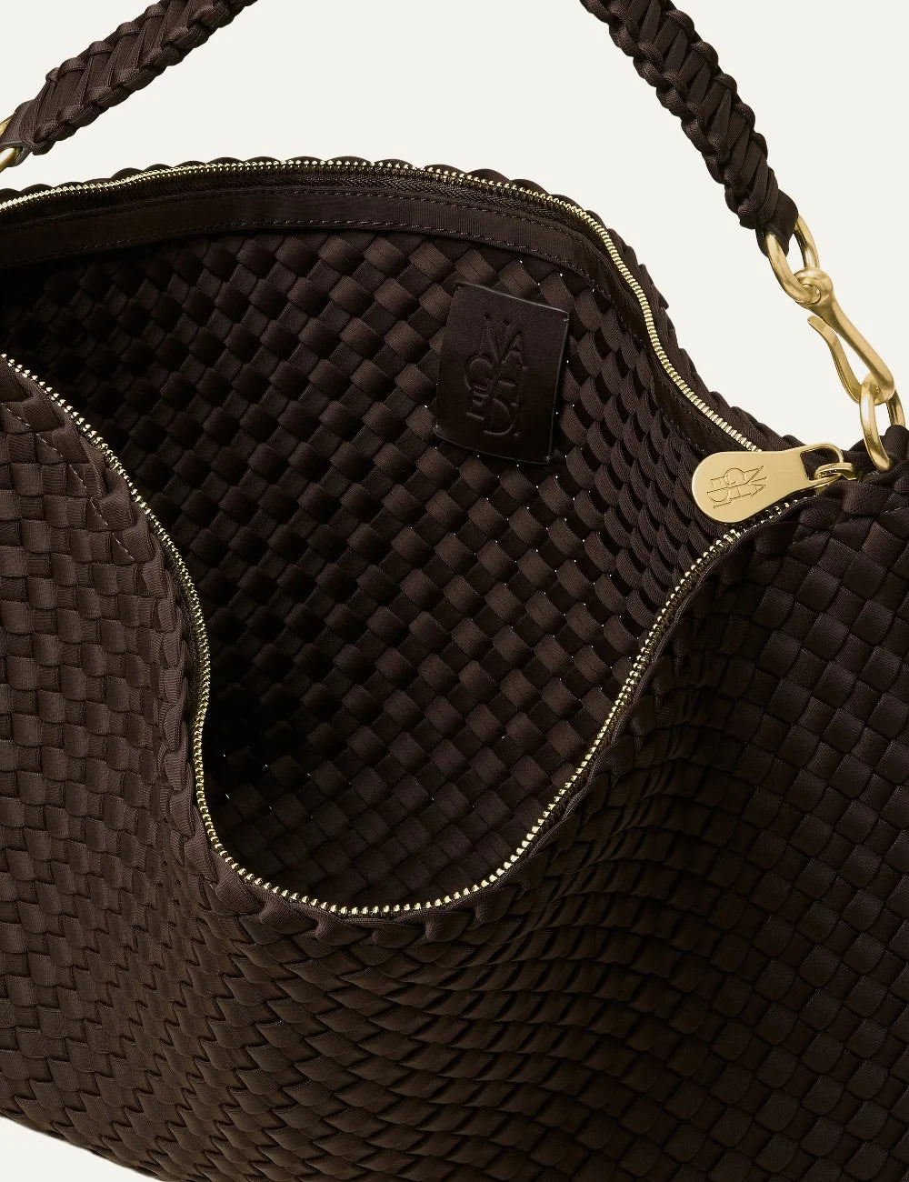 Women's Naghedi Porto Medium Half-Moon Bag in dark chocolate brown handwoven neoprene with shoulder strap details view