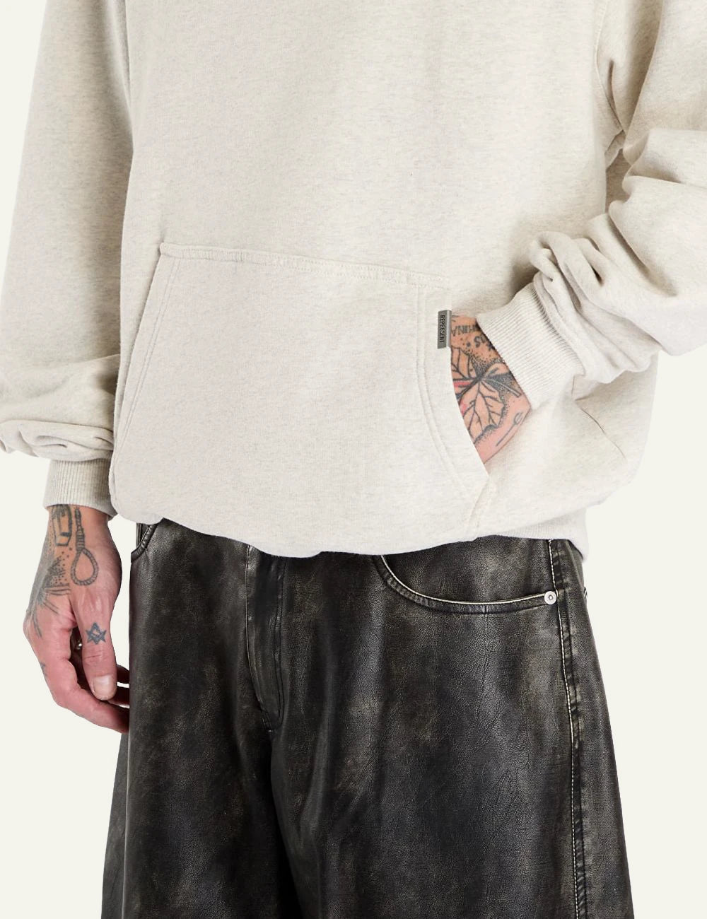 Represent Patron Club Hoodie Beige pocket detail