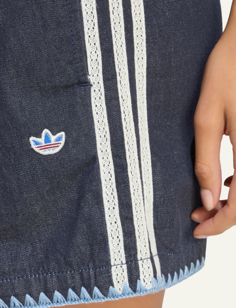 adidas indigo denim women’s shorts close up stripes and logo details