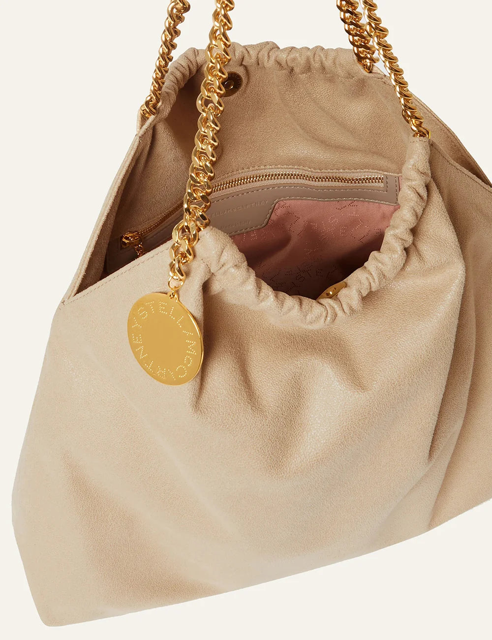 Stella McCartney Falabella drawstring tote buttercream vegan bag gold chain interior view
