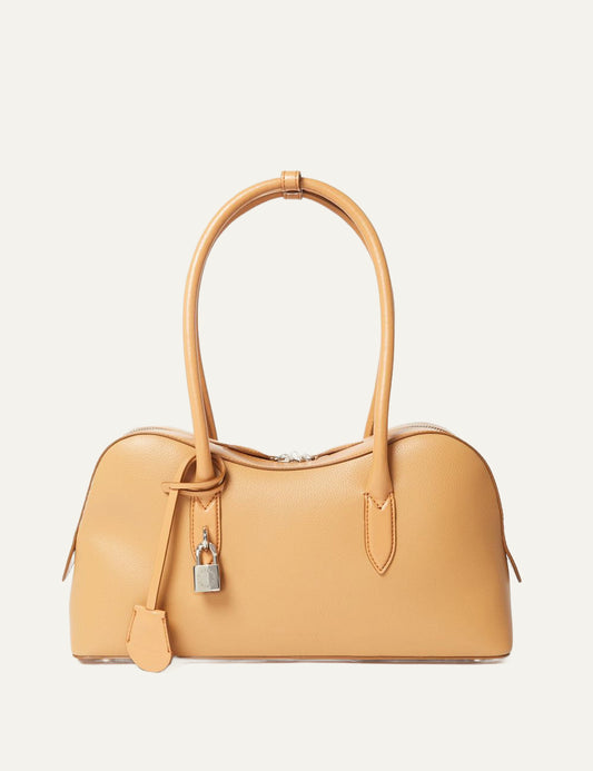 Stella McCartney Ryder bag front view honey vegan leather with padlock detail