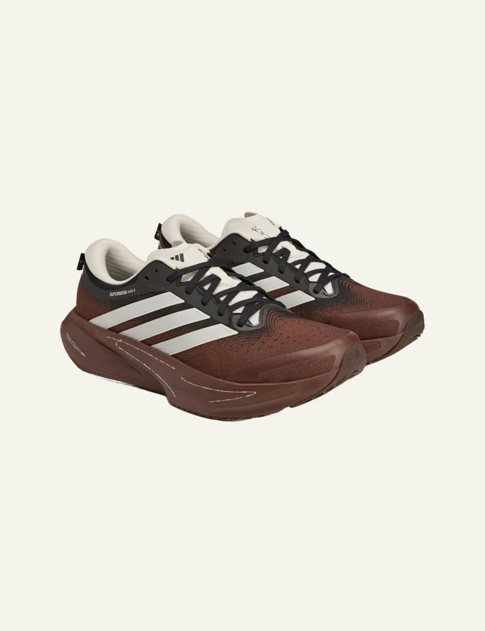 Adidas Supernova Rise 3 running shoe se auburn me white stripes angled view