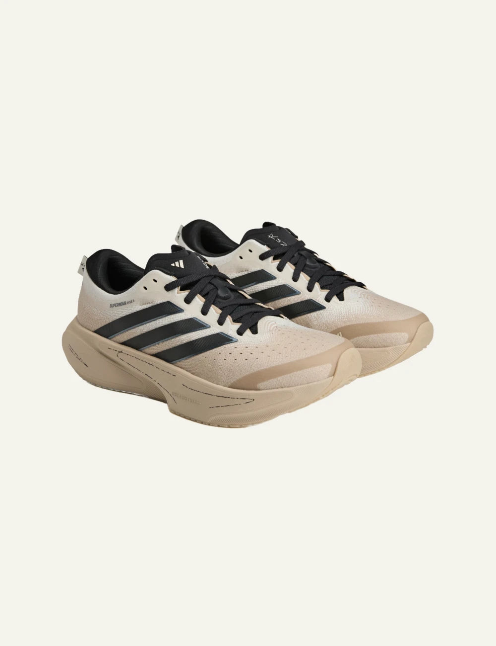 Adidas Supernova Rise 3 sneaker se beige me black stripes angled view