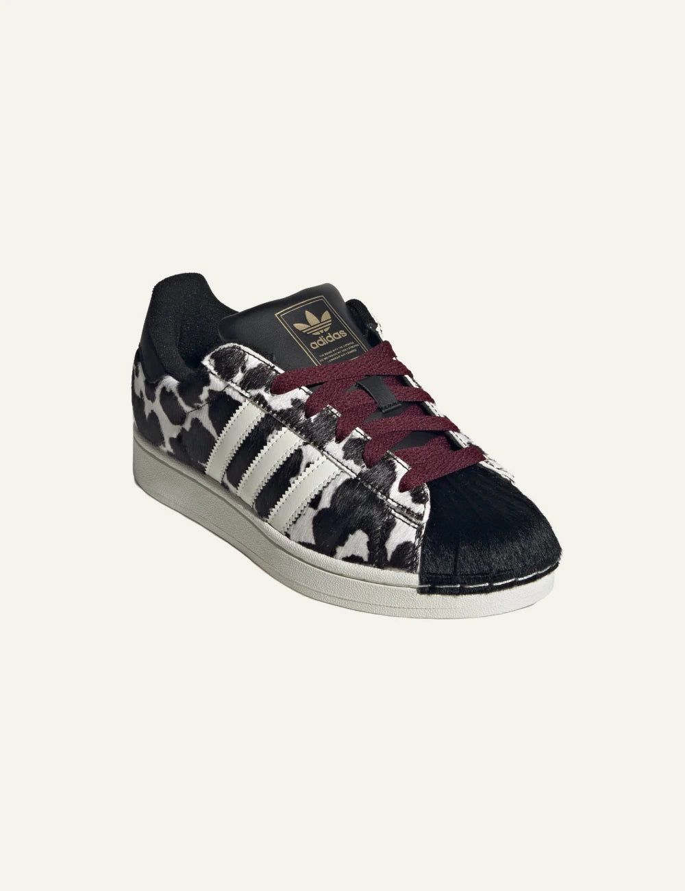 Adidas Originals Superstar II women's black and white cow print sneakers front  angle view