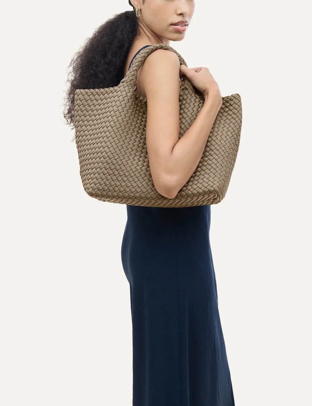 Women's Naghedi St. Barths Medium Tote in Cashmere taupe handwoven neoprene with woven handleson model