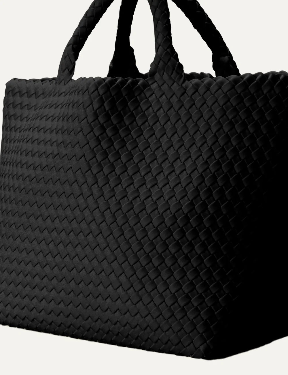 Women's Naghedi St. Barths Medium Tote in true black handwoven neoprene with woven handles side view
