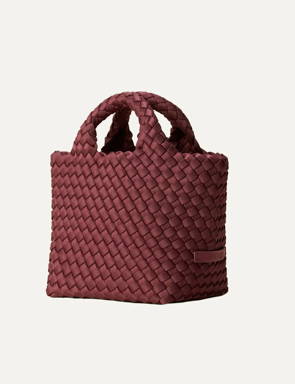 Women's Naghedi St. Barths Petit Tote in Bordeaux burgundy handwoven neoprene with detachable crossbody strap side view