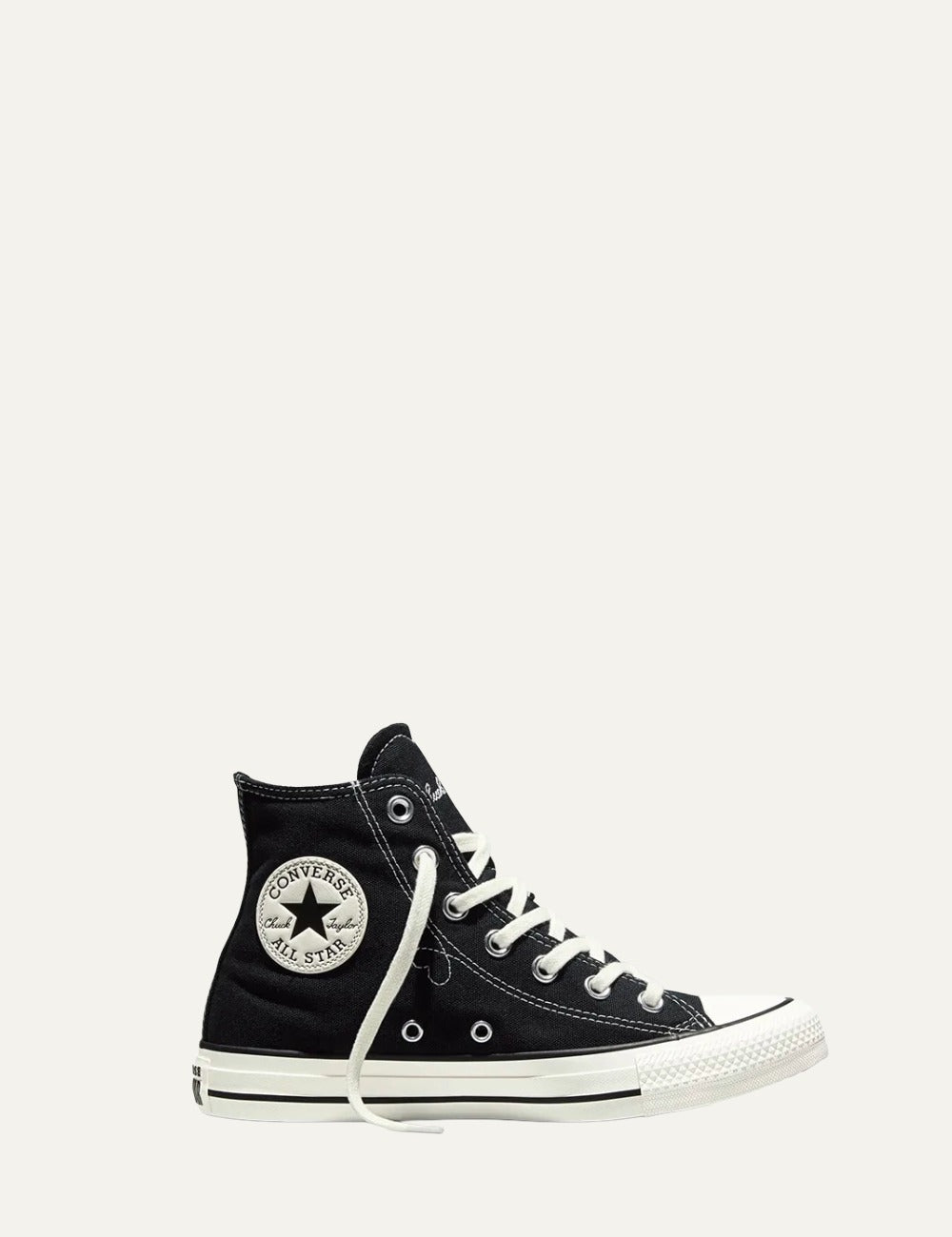 Converse Chuck Taylor All Star high-top sneaker in black canvas with white rubber sole, side logo view