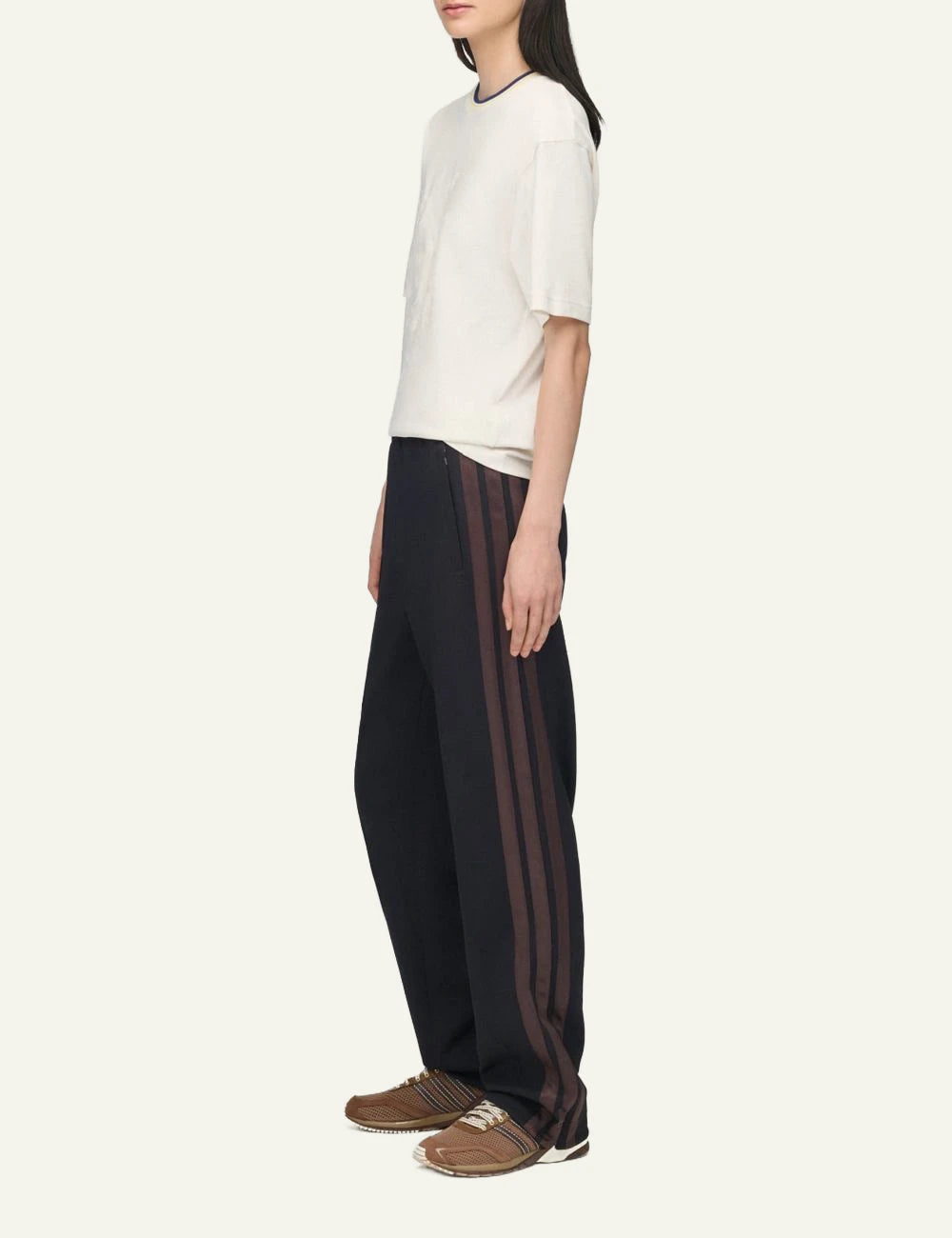 Adidas Y-3 x Wales Bonner black track pants with side stripes model