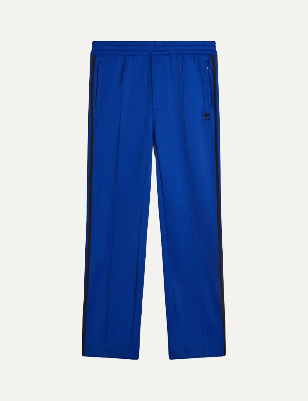 Men's Adidas Originals x Wales Bonner royal blue drop crotch track pants with dark side stripes, straight legs and embroidered Trefoil logo, product shot