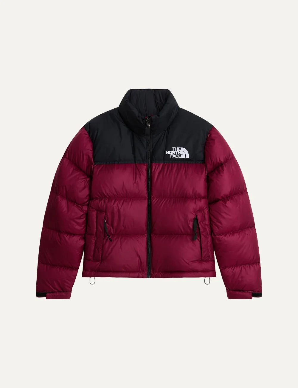 The North Face women's 1996 Retro Nuptse puffer jacket in burgundy and black with quilted down panels, high collar, front zipper and white chest logo.
