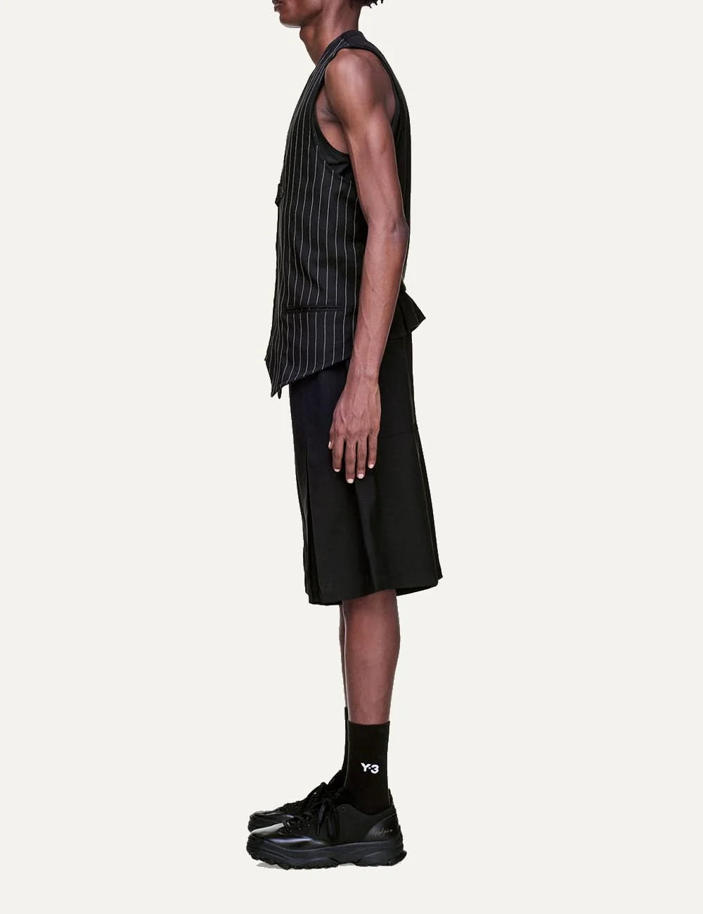Y-3 Sport Uniform pleated shorts black men model side full body view