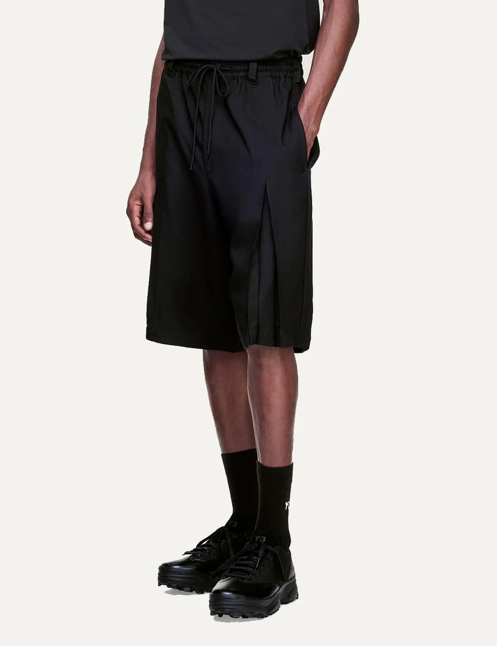 Y-3 Sport Uniform pleated shorts black men model side view