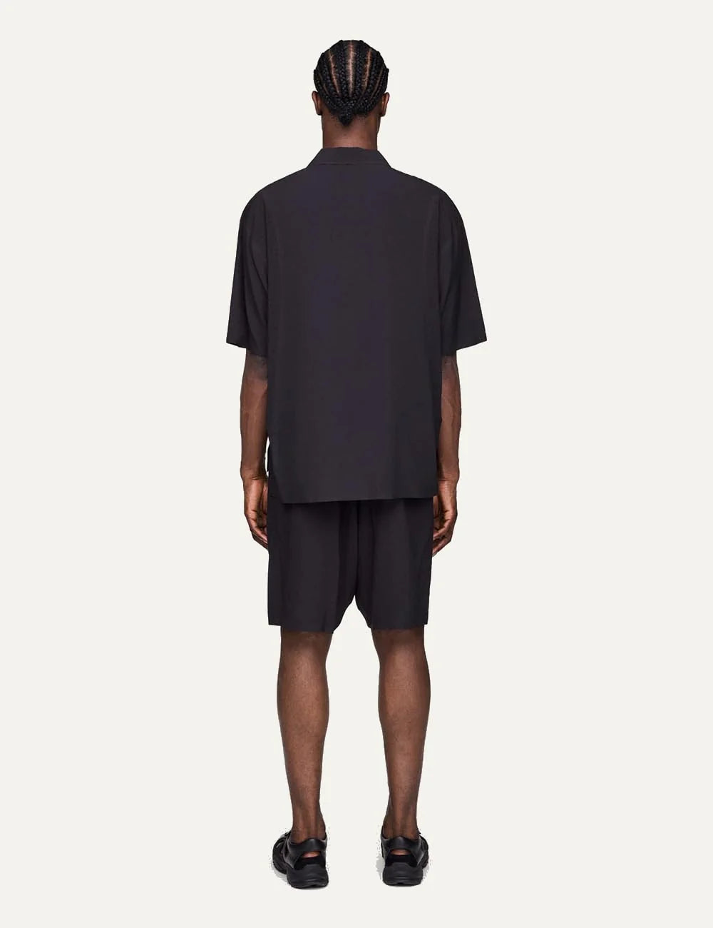Y-3 Sport Uniform pleated shorts black men model back view