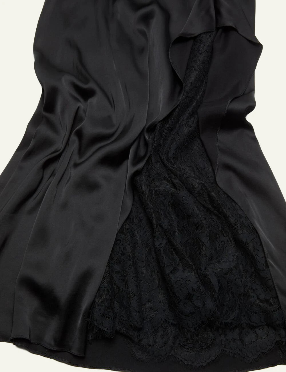 Acne Studios black slip dress with thin straps and fluid silhouette detail view