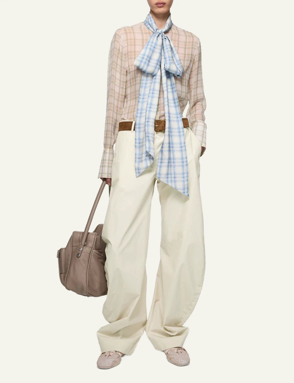 Acne Studios cream wide leg trousers in lightweight cotton full body view