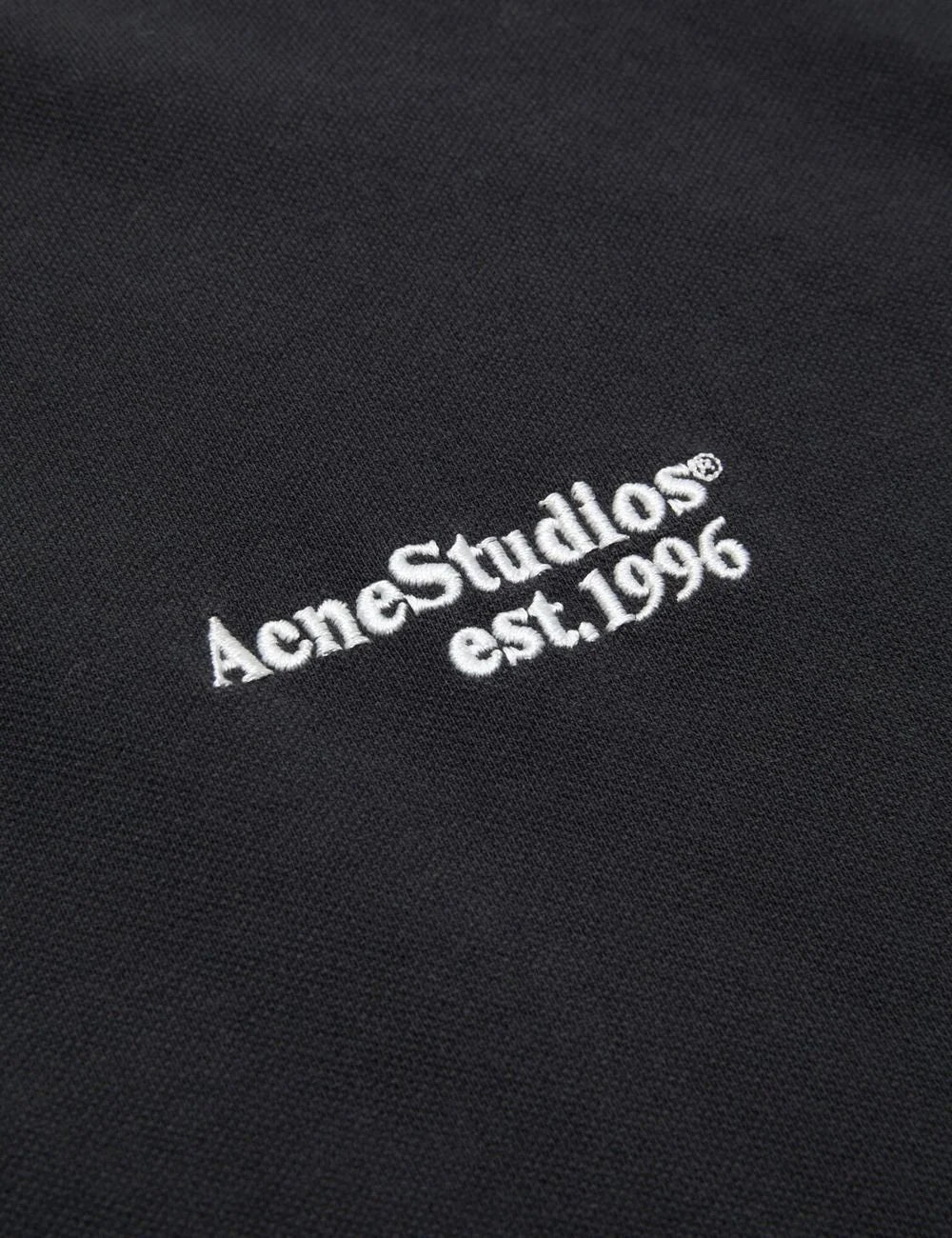 Acne Studios polo t-shirt black organic cotton relaxed fit front detail view