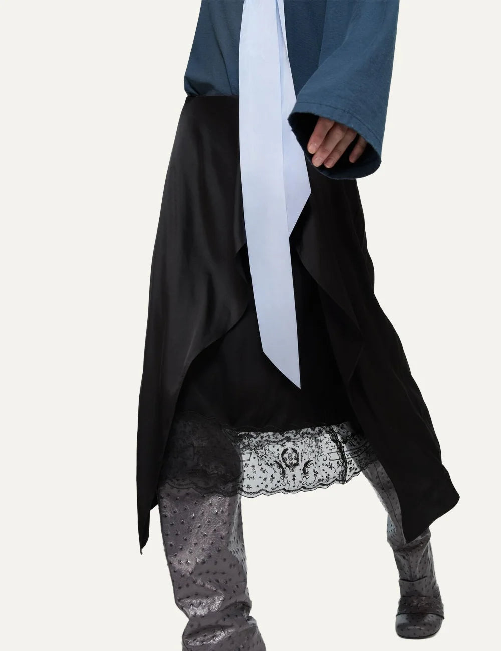 Acne Studios women's black satin skirt with an asymmetric layered design, cascading ruffles, delicate lace underlayer and below-knee length side