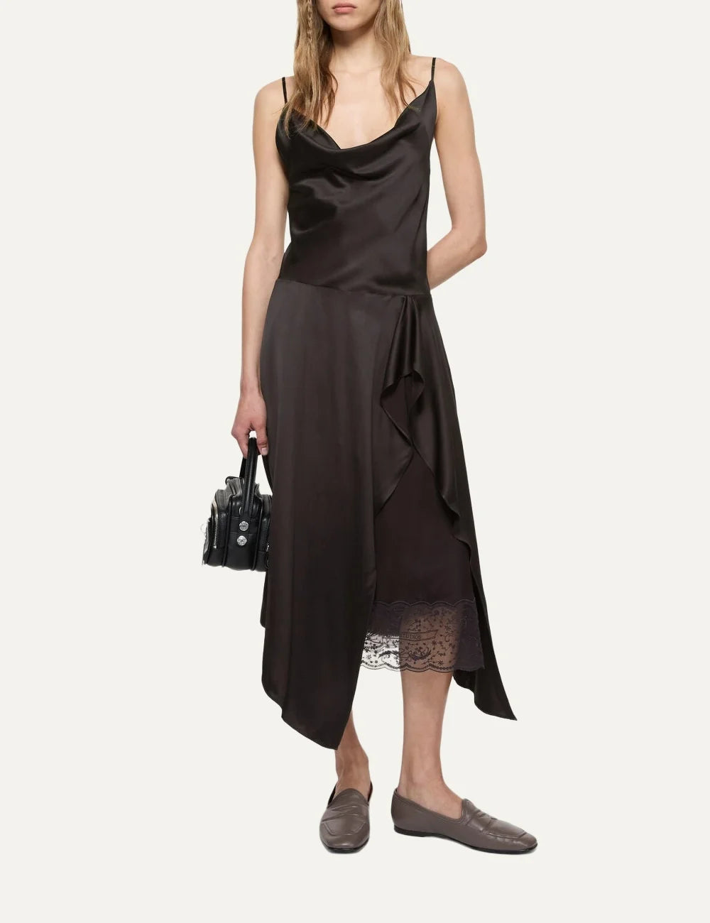 Acne Studios women's dark brown satin midi slip dress with a draped cowl neckline, adjustable spaghetti straps, front ruffled slit and delicate dark brown lace underlayer full body