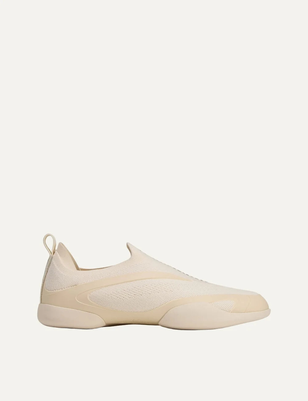 Adidas by Stella McCartney Taekwondo beige slip-on sneakers with breathable knit upper, curved side overlays and low-profile rubber sole.