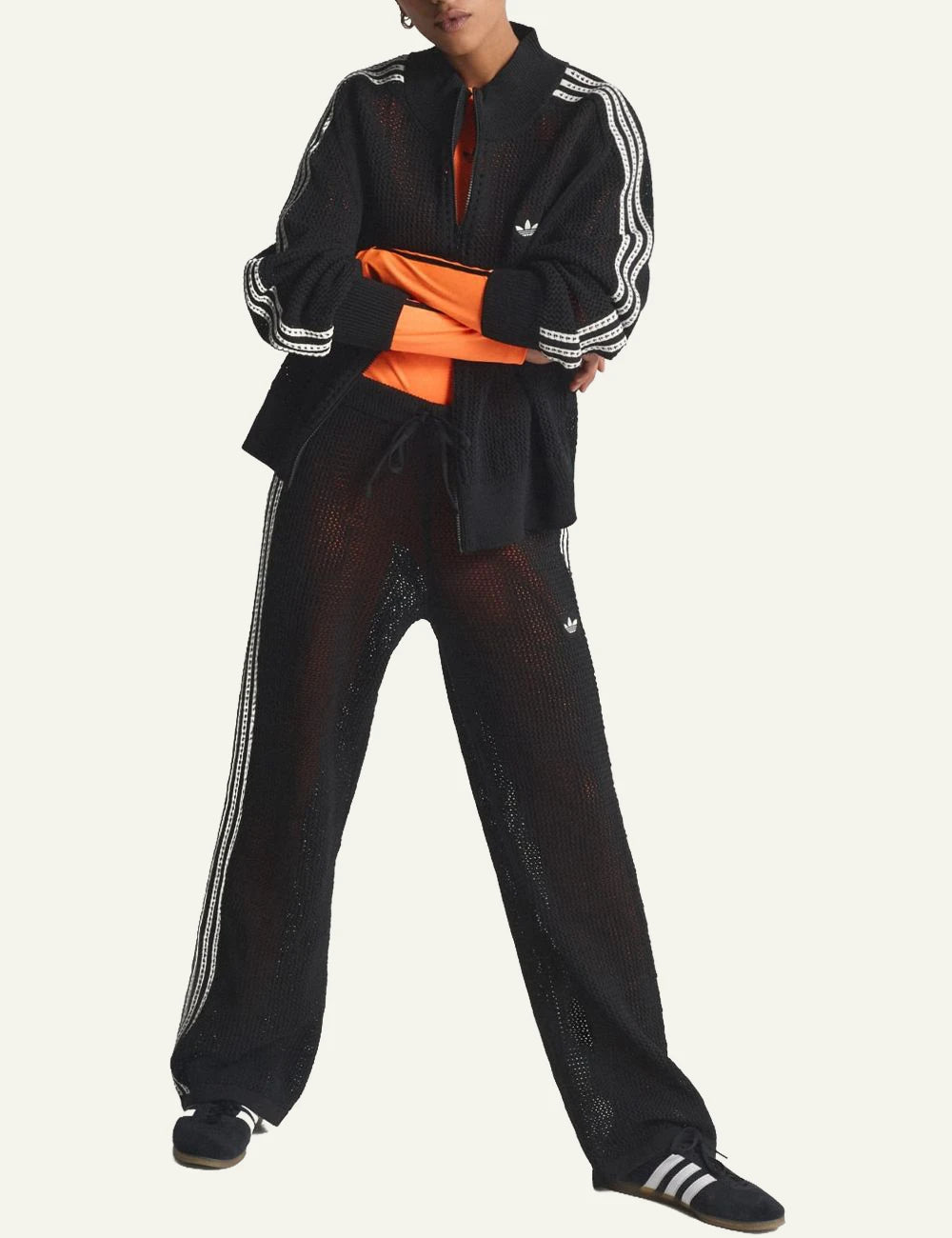 Adidas Firebird knit pants black mesh stripes wide leg front model view