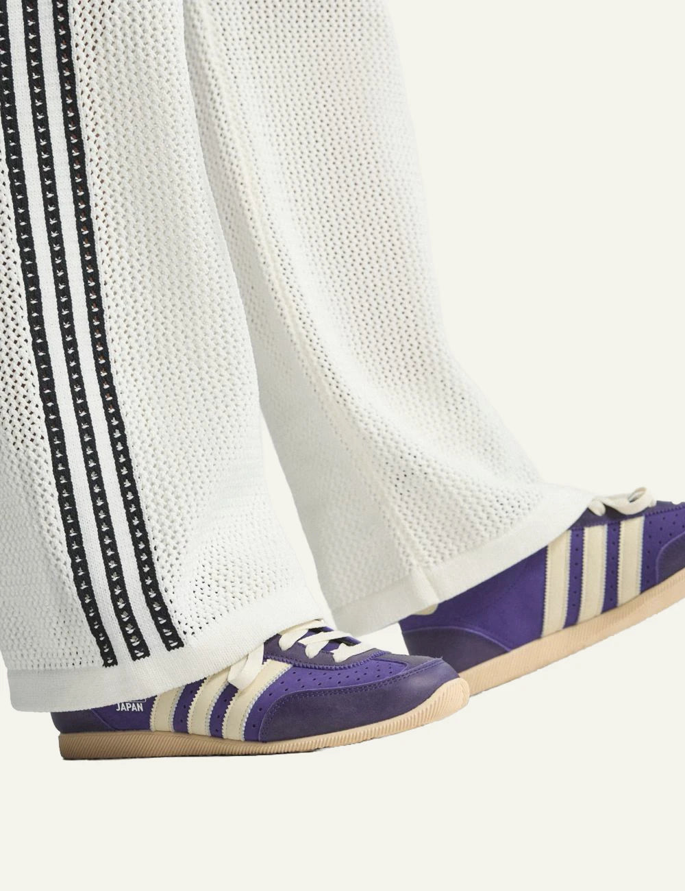 Adidas Firebird knit pants off white mesh stripes wide leg side detail view