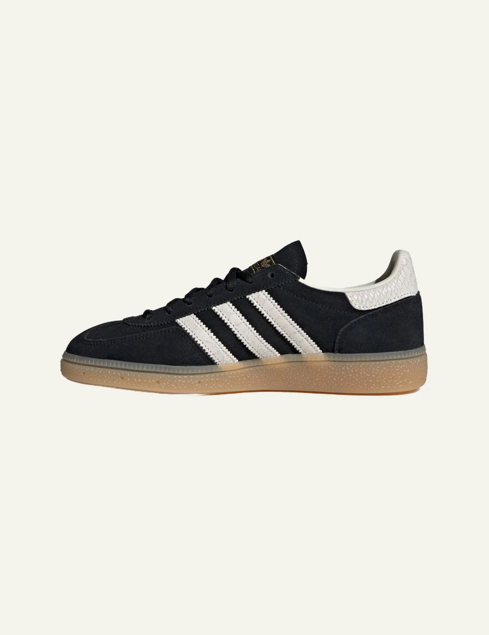 Adidas Handball Spezial black leather sneakers white stripes profile view