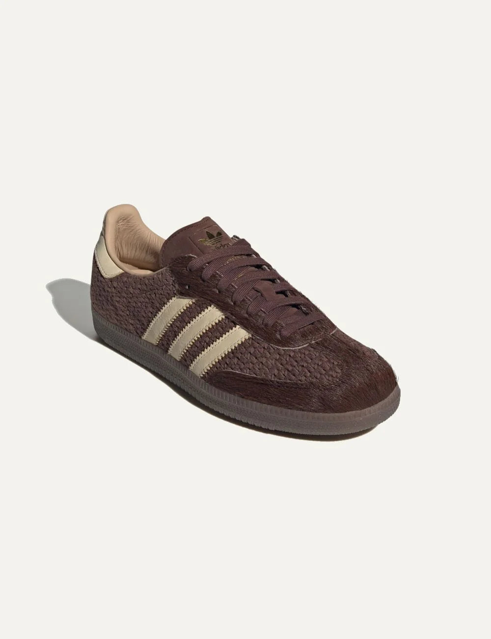 Adidas women's Samba OG brown sneakers with woven textile upper, textured leather overlays and beige stripes angled