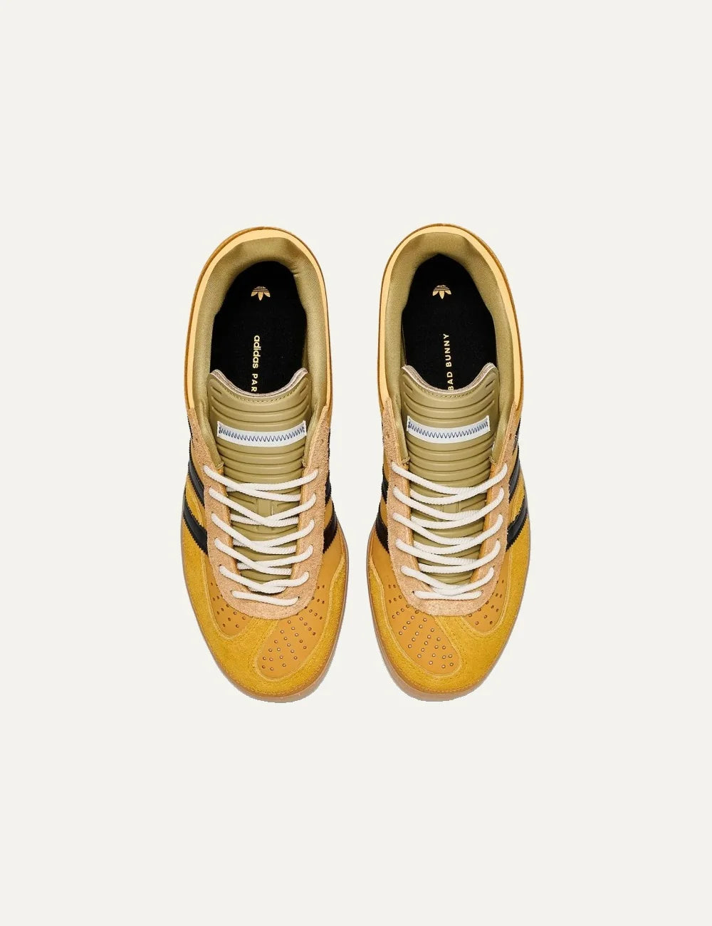Bad Bunny x Adidas men's Gazelle Indoor sneakers in solar gold suede and leather with black stripes and gum sole top