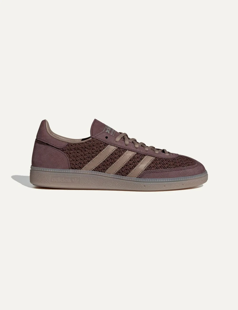 Adidas women's Handball Spezial brown sneakers with woven cotton mesh, nubuck overlays and beige leather stripes.