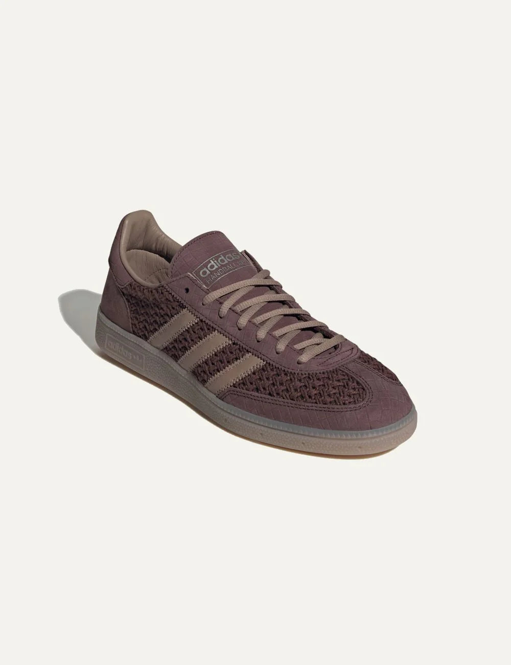 Adidas women's Handball Spezial brown sneakers with woven cotton mesh, nubuck overlays and beige leather stripes angled