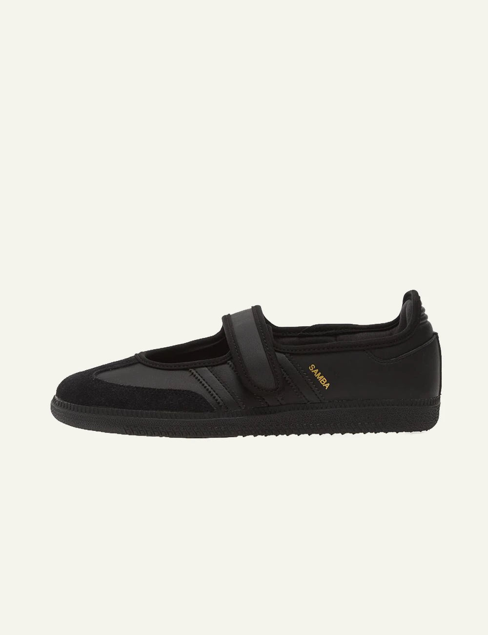 Adidas Originals black leather and suede slip on sneakers profile