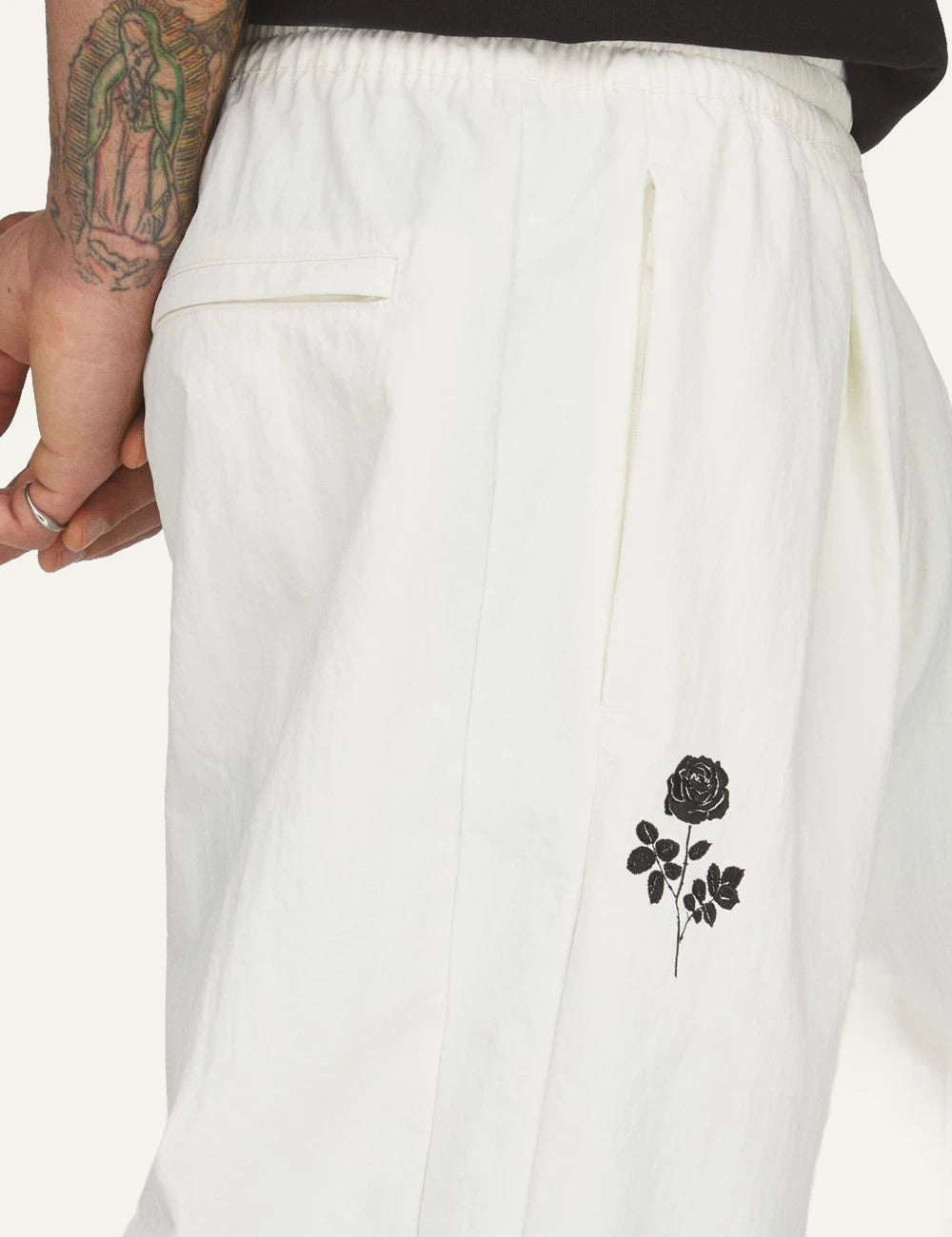 adidas Originals Chavarria woven track pants off white oversized side stripe side detail view