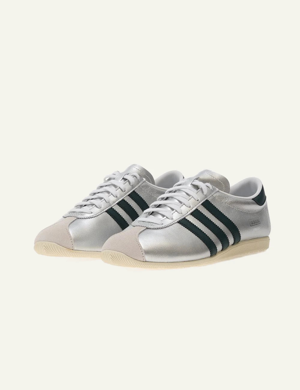 adidas originals silver leather sneakers grey angled view three stripes