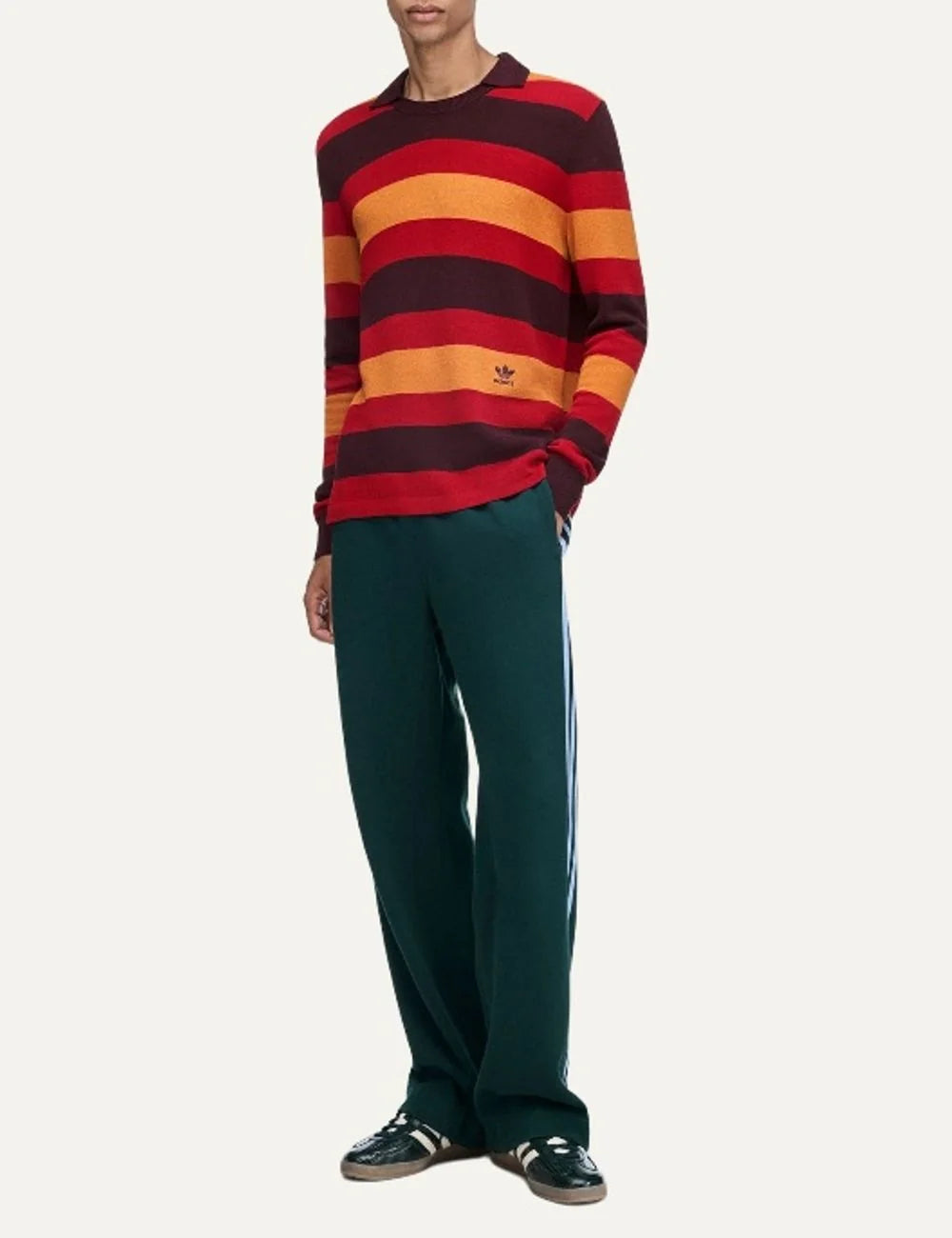 Adidas Originals x Wales Bonner men's striped knit sweater in burgundy, red and orange with layered collar, long sleeves and small Trefoil logo. full look