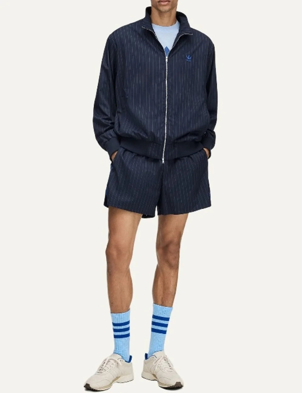 Men's Adidas Originals x Wales Bonner navy blue pinstripe track jacket with stand collar, blue Trefoil logo and front zip closure, full look