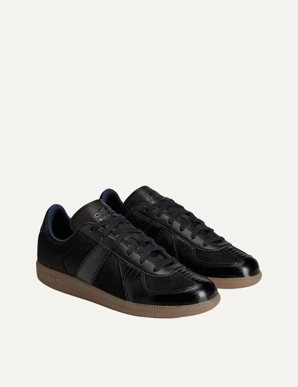 Unisex Adidas Originals x Wales Bonner Karintha BW Army black leather sneakers with pony hair texture, embossed panels and gum sole,pair front angle
