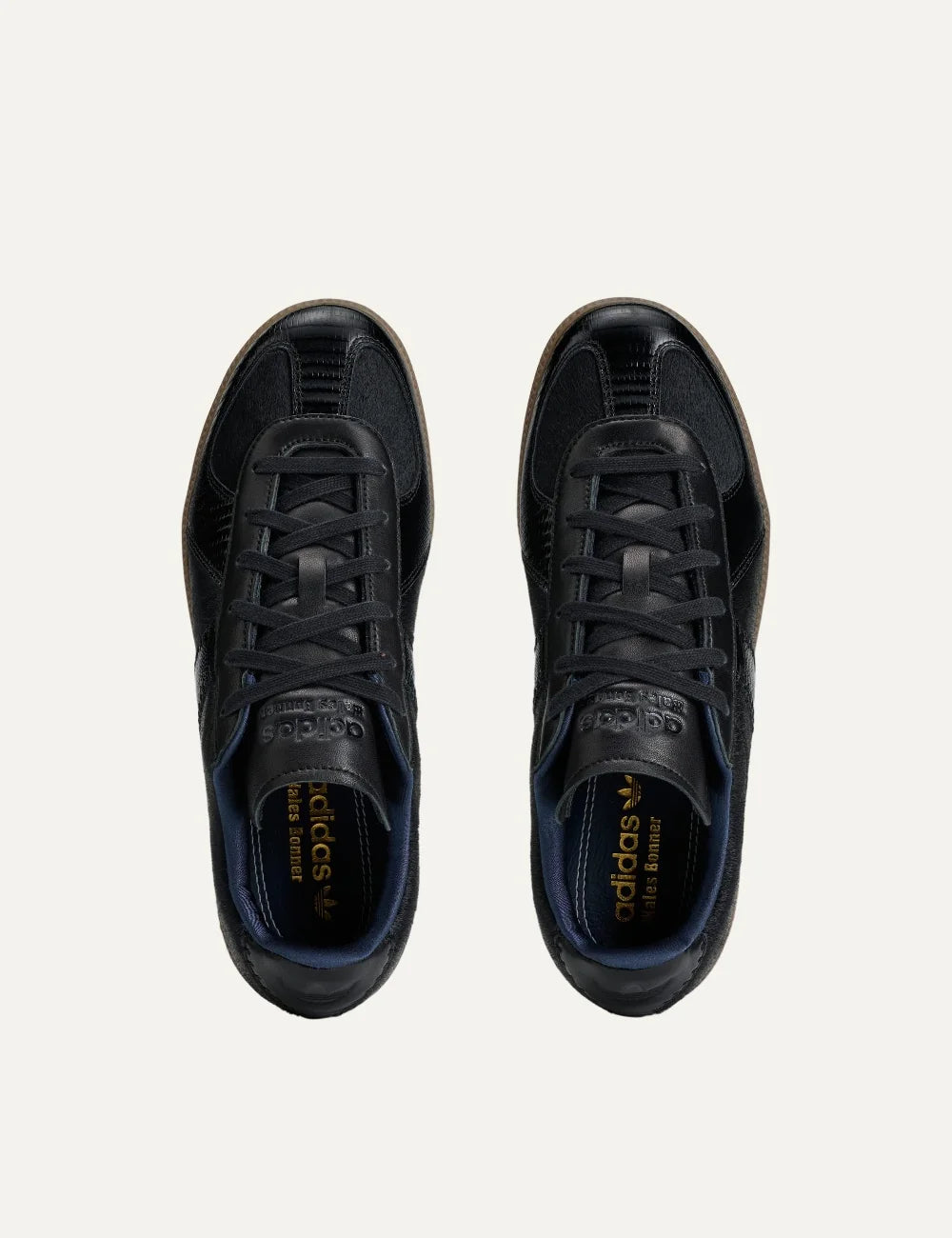 Unisex Adidas Originals x Wales Bonner Karintha BW Army black leather sneakers with pony hair texture, embossed panels and gum sole, top view