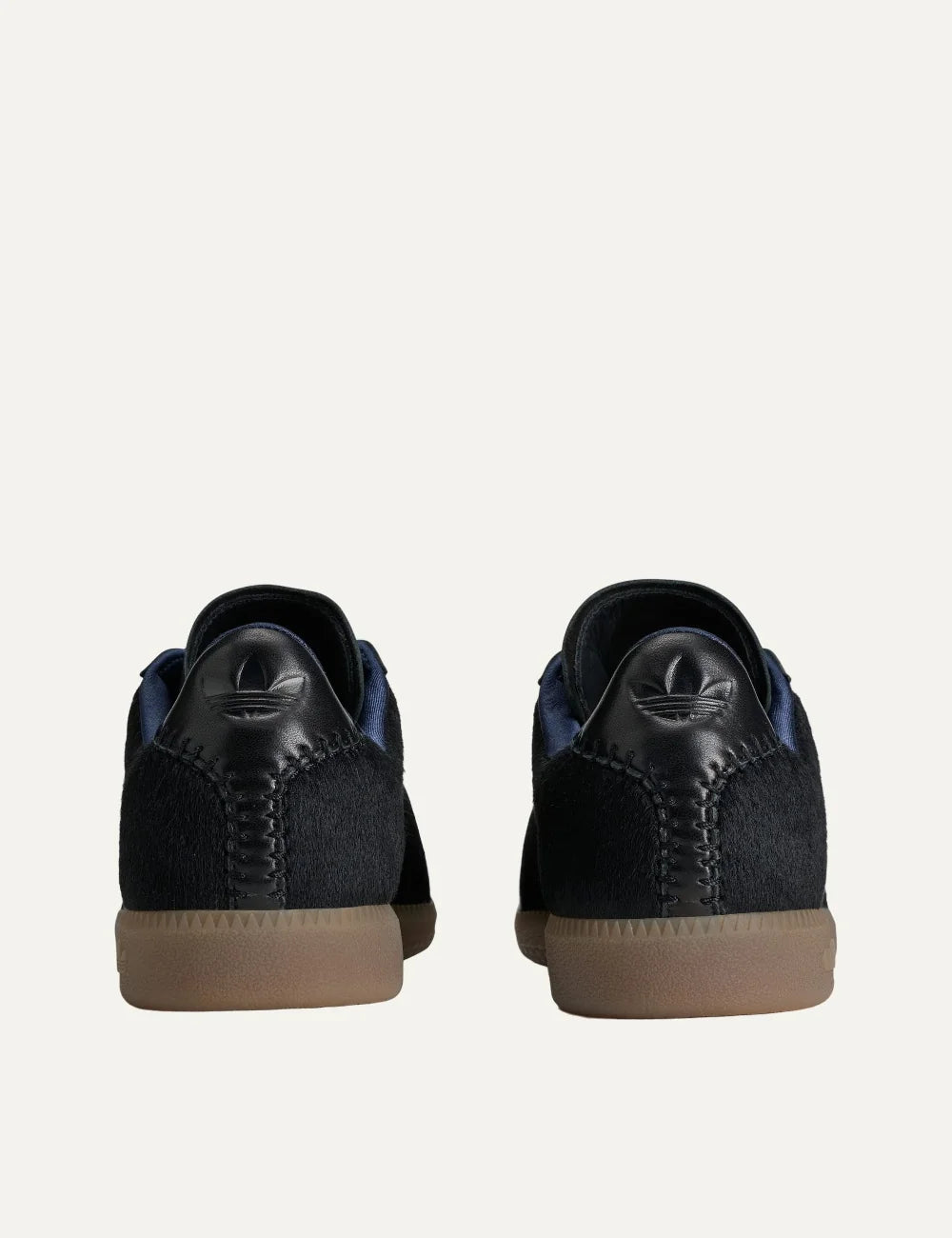 Unisex Adidas Originals x Wales Bonner Karintha BW Army black leather sneakers with pony hair texture, embossed panels and gum sole, back view