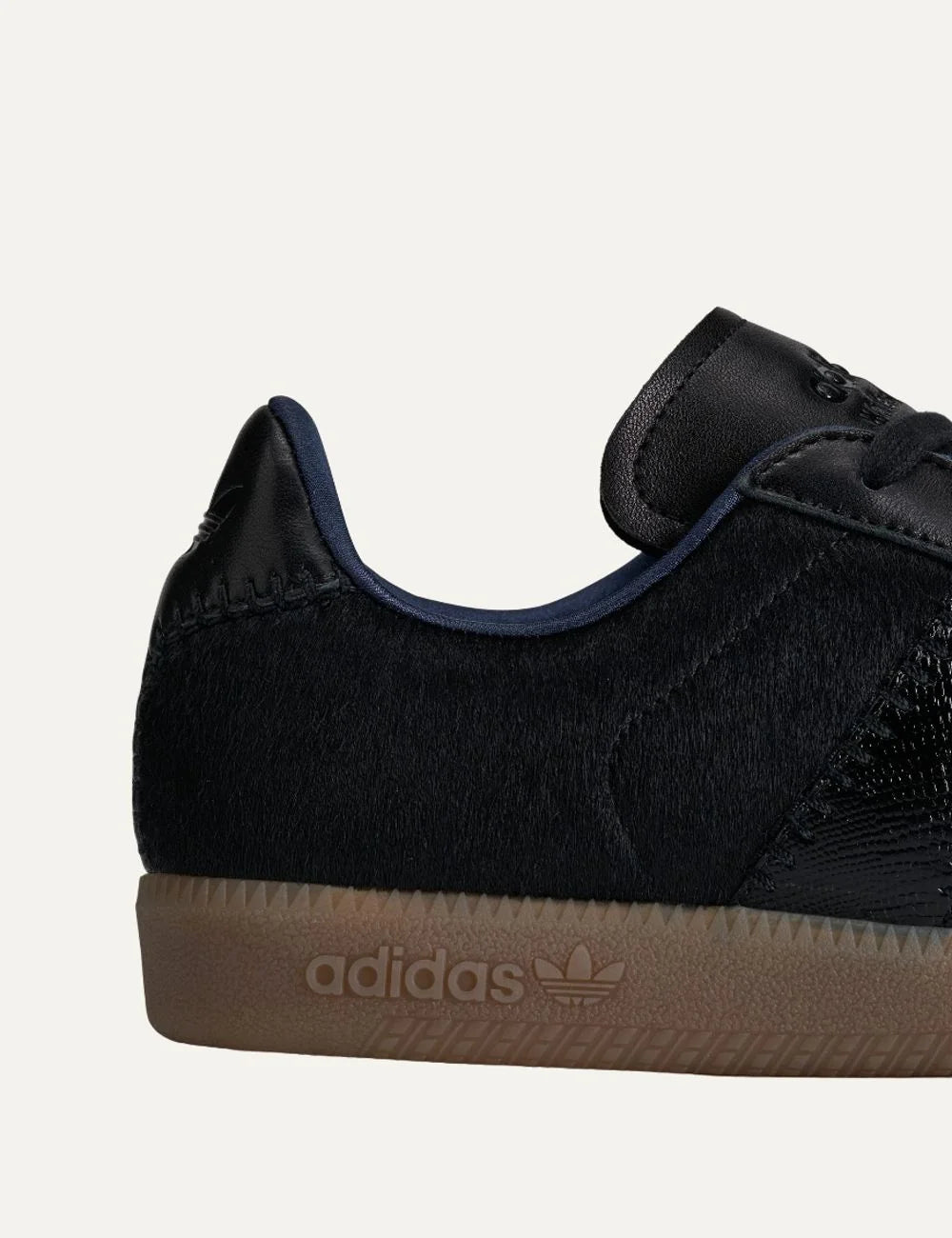 Unisex Adidas Originals x Wales Bonner Karintha BW Army black leather sneakers with pony hair texture, embossed panels and gum sole, close up details