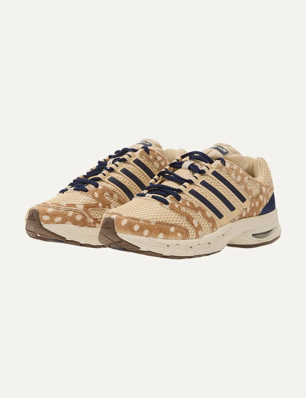 adidas Originals women Adistar Control 5 deer print beige sneakers with navy details angled