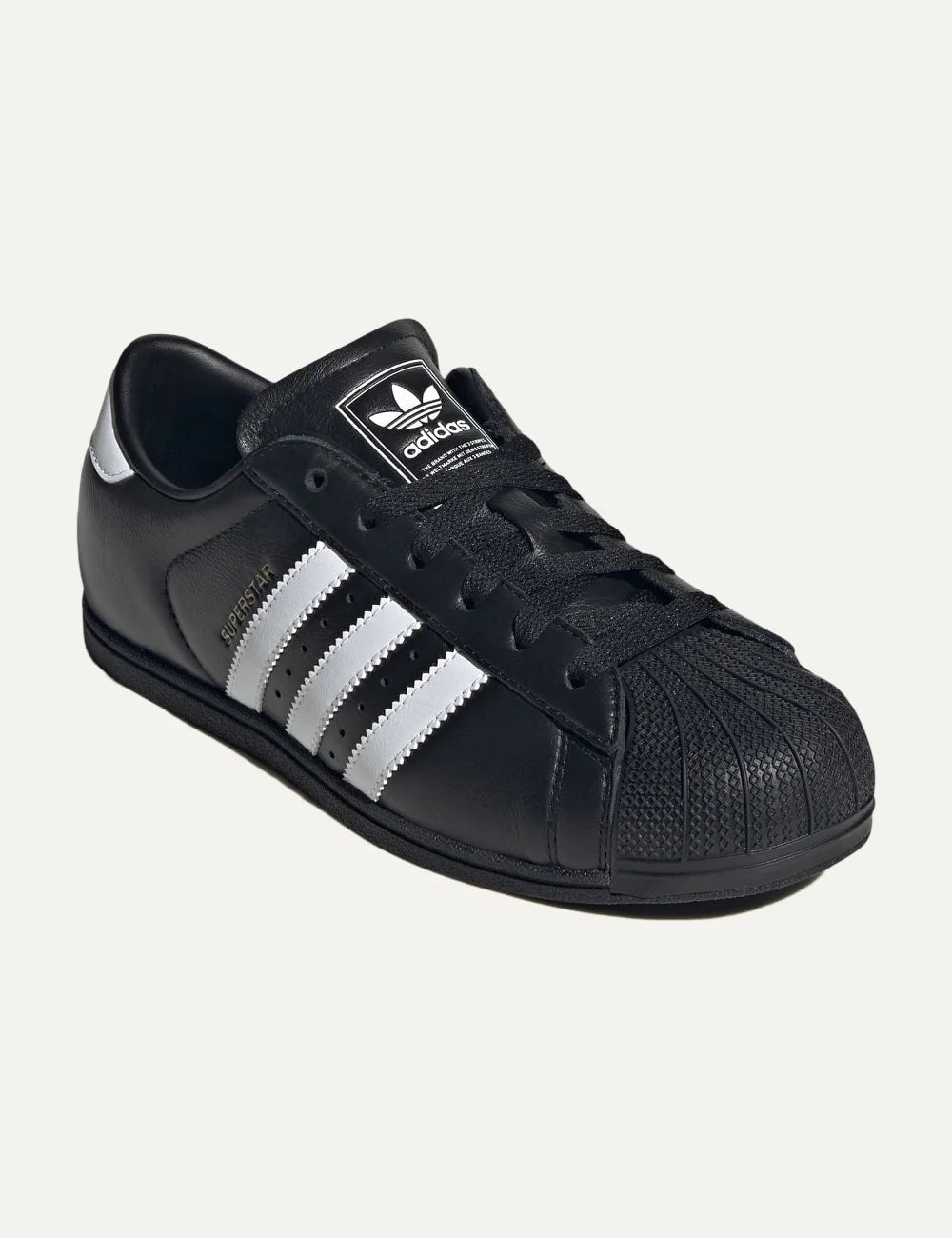 adidas Originals women Superstar Lo Pro black leather sneakers with white stripes and shell toe angled