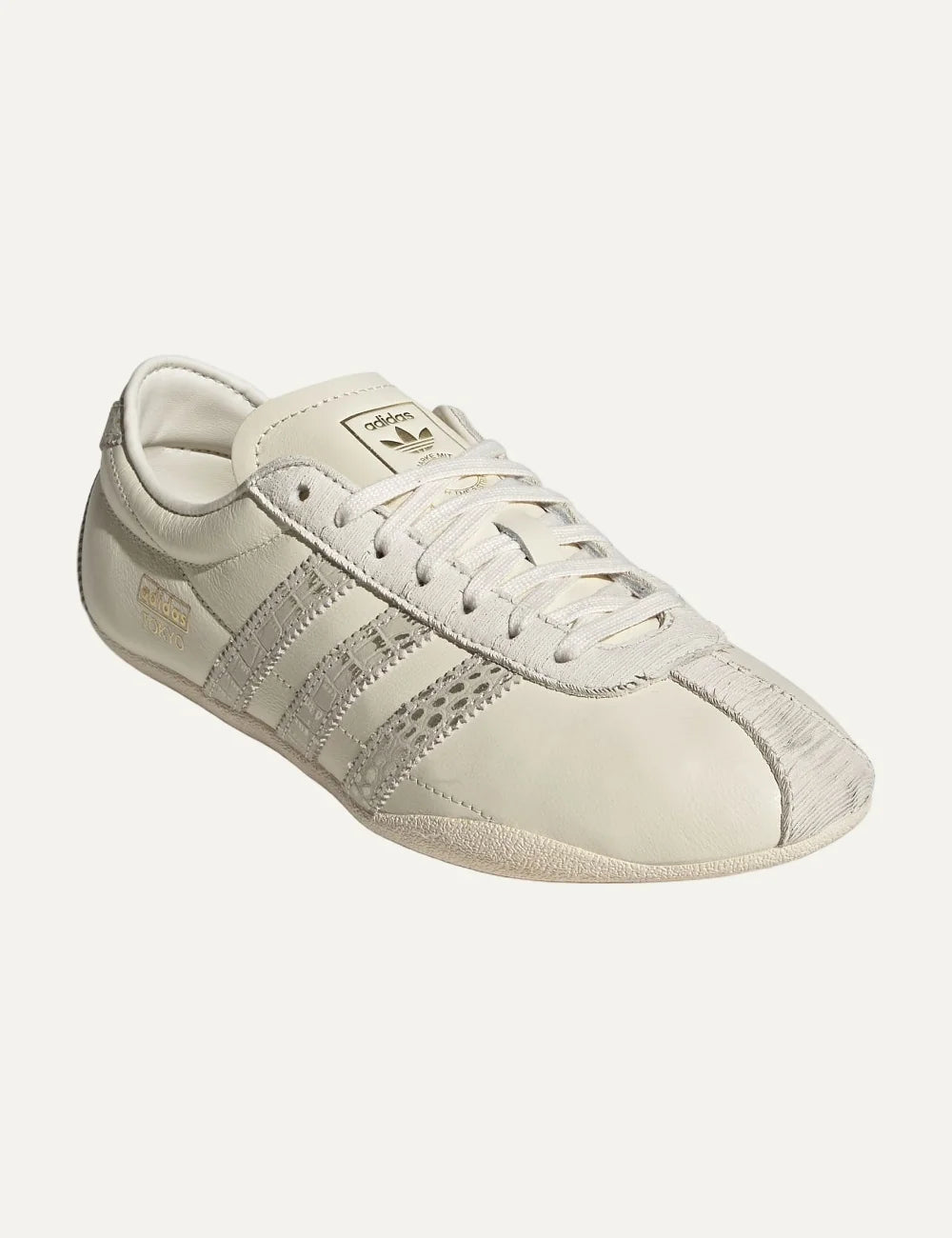 adidas Originals women Tokyo Cream White leather sneakers with metallic gold details angled
