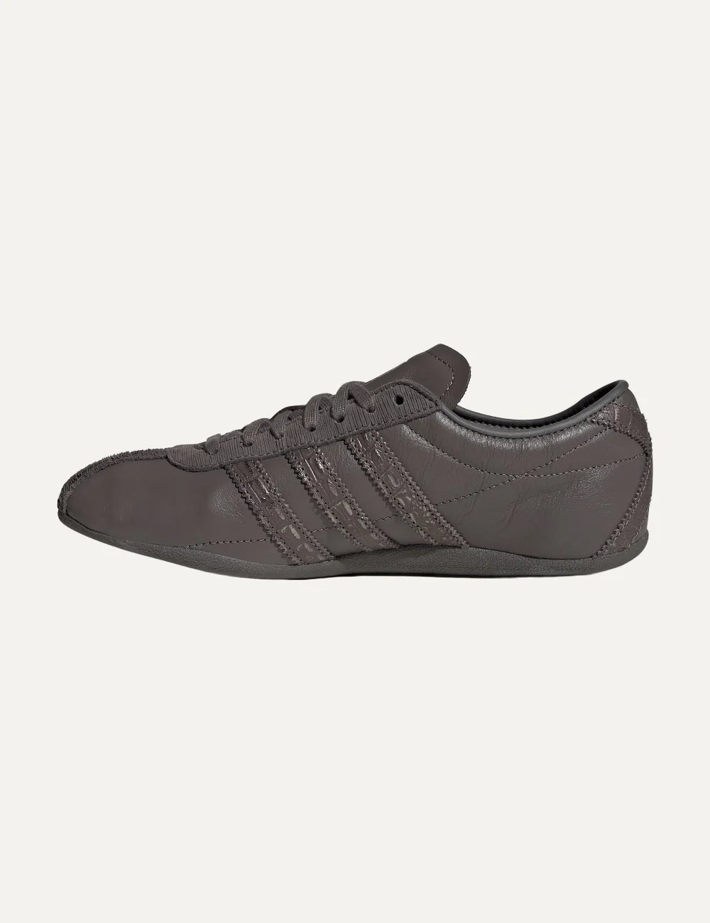 adidas Originals women Tokyo charcoal leather sneakers with textured stripes and gold logo profile