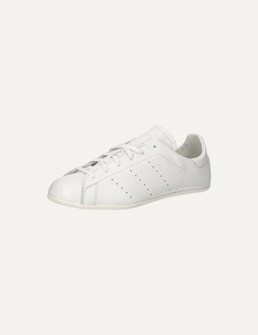 adidas Originals women white leather low-top sneakers with perforated 3-Stripes and rubber sole angled