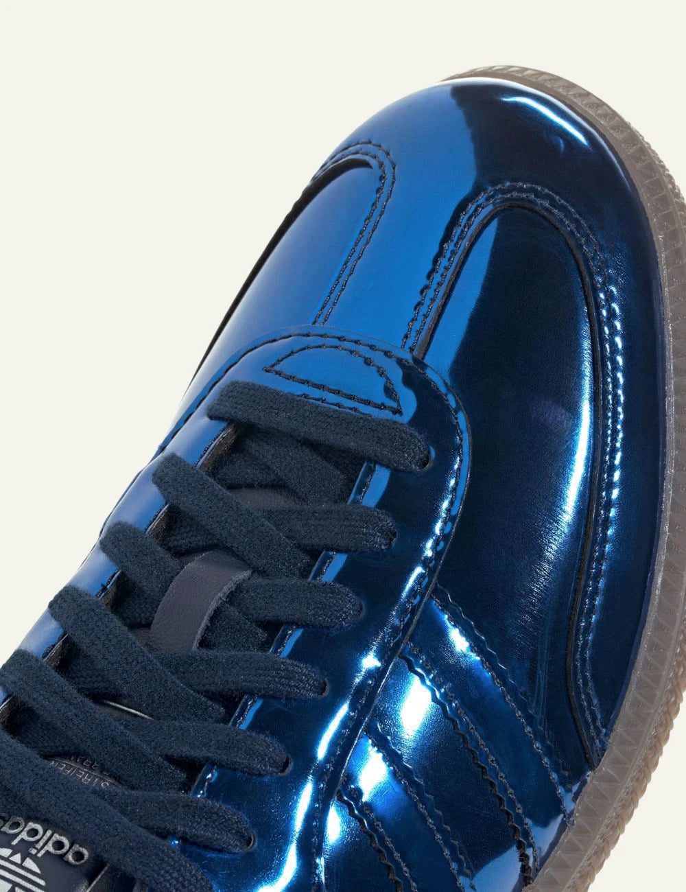 Women's Adidas Originals Samba OG sneakers in metallic Night Indigo blue with gum sole angled