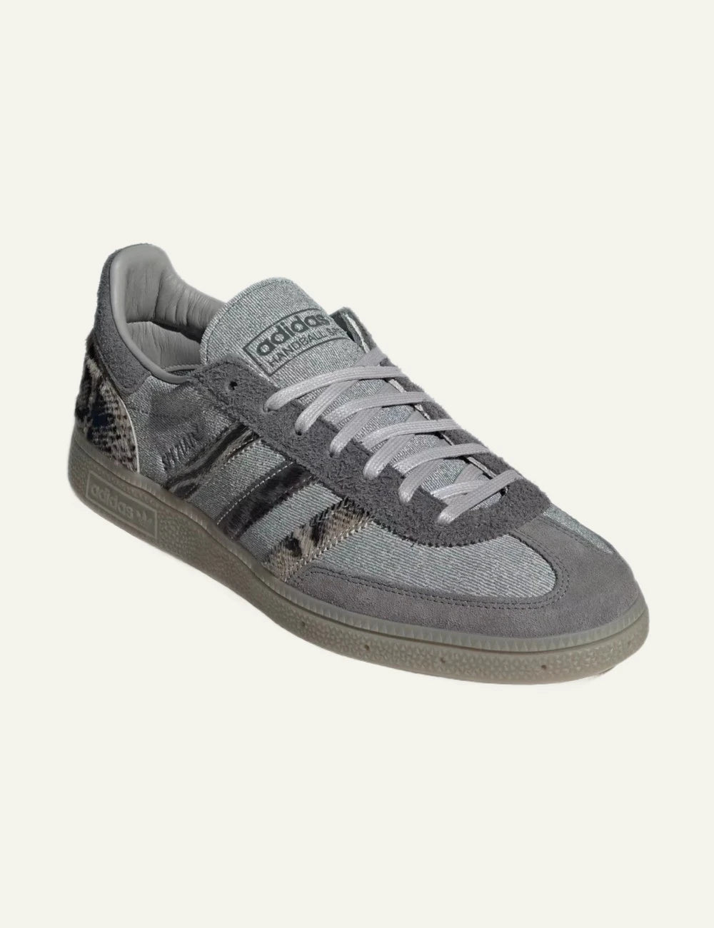 Women's adidas Originals Spezial sneakers in grey leather with suede overlays, animal print details and rubber sole angled