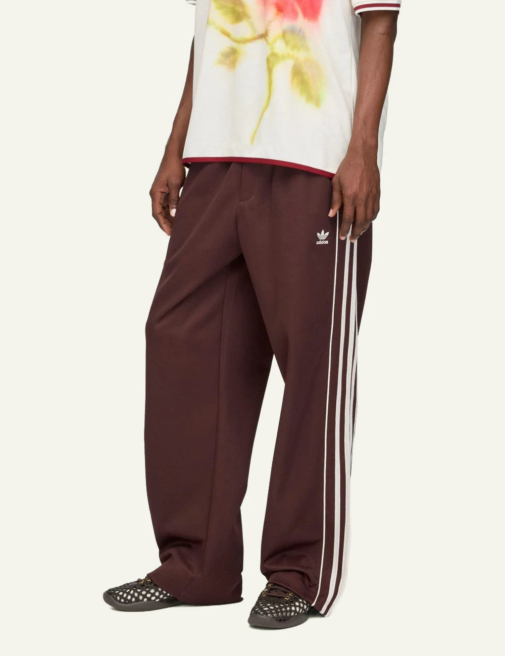 Adidas Wales Bonner track pants brown stripes wide leg front model view