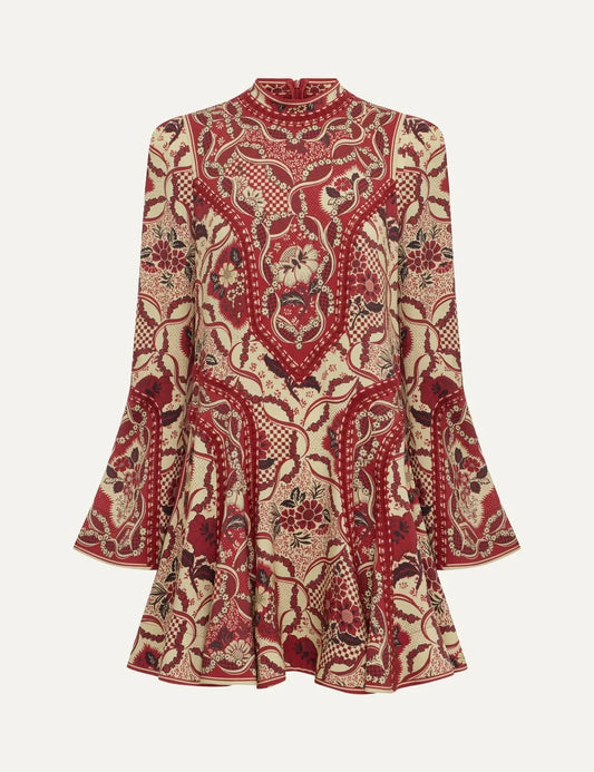 Alemais Kenny women's red and cream floral bandana print mini dress with mock neck, applique details, flared long sleeves and a flared skirt.